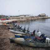 ...si danno appuntamento nella scuola di sport nautici �Cat surf� di Cala San Giorgio, foce dell�omonima lama